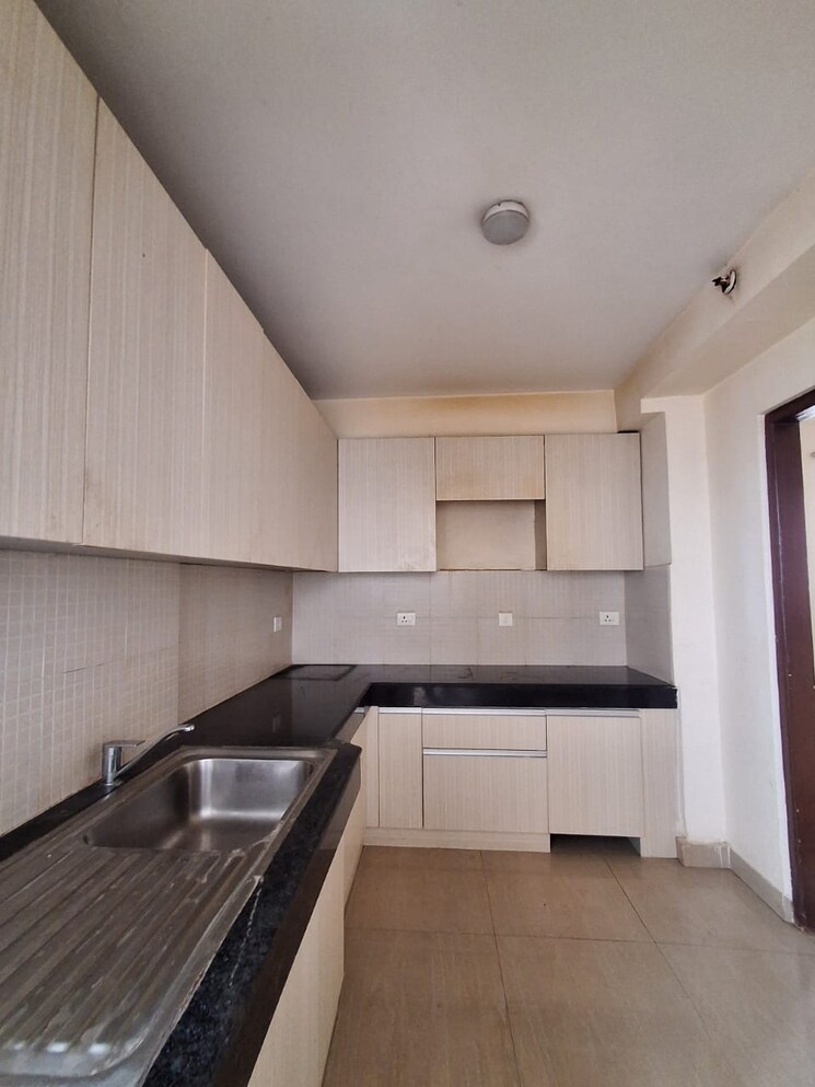 Kitchen, shapoorji-pallonji-joyville-phase-2 3 Bedroom 1852 Sq.Ft. Apartment In Sector 102 Gurgaon 8164076