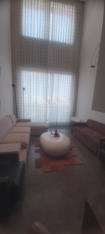 Living Room in 5 BHK Apartment at Suraj Oranje Castle, Gomti Nagar – for Sale