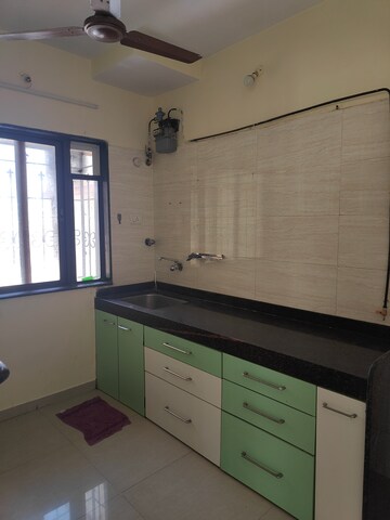 Kitchen in 1 BHK Apartment at Lokpuram CHS, Vasant Vihar – for Rent