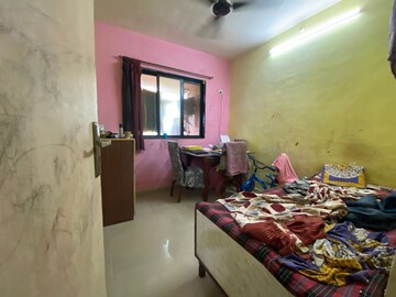 Bedroom in 2 BHK Apartment at Lodha Park, Dombivli East – for Sale