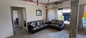 Living Room in 2 BHK Apartment at Wadhwa TW Gardens, Kandivali East – for Rent