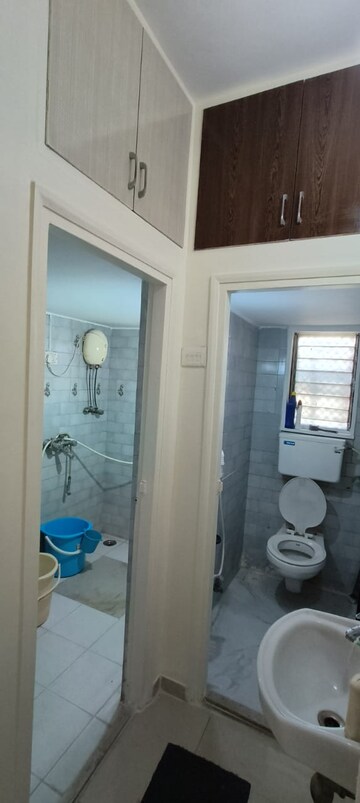 Bathroom in 2 BHK Apartment at Wadhwa TW Gardens, Kandivali East – for Rent