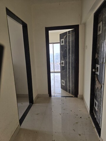 Building Lobby in 2 BHK Apartment at Bhatia Esspee Towers, Borivali East – for Sale