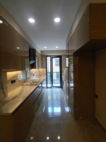 Kitchen in 4 BHK Builder Floor at Infinite Luxury, South City 2 – for Sale