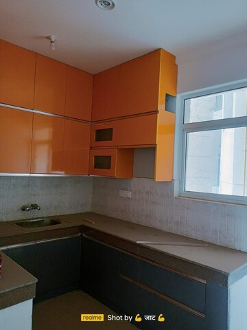 Kitchen in 2 BHK Apartment at Amrapali Silicon City, Sector 76 – for Rent
