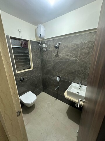 Bathroom in 1 BHK Apartment at Vardhman Grandeur, Andheri West – for Rent