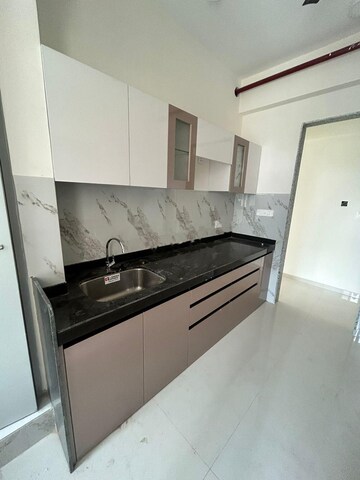 Kitchen in 1 BHK Apartment at Omkar Vive, Kurla – for Rent