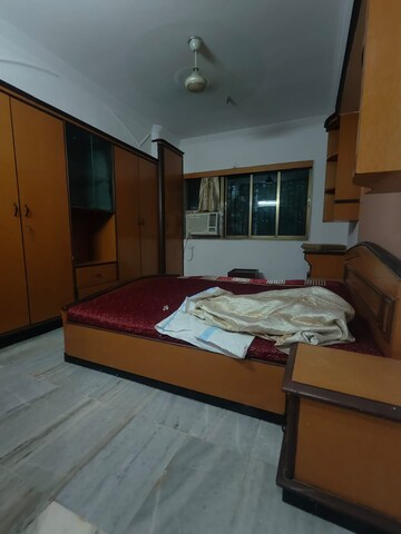 Bedroom in 3 BHK Apartment at Shwetambara CHS, Kandivali West – for Rent