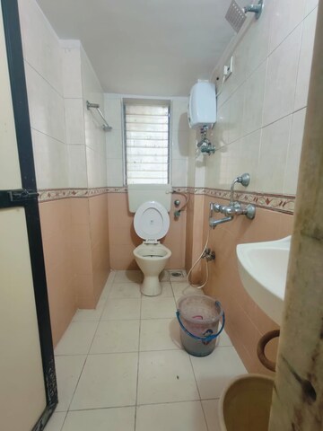Bathroom in 2 BHK Apartment at Ani Anu Sri Balaji Enclave, Malad West – for Sale