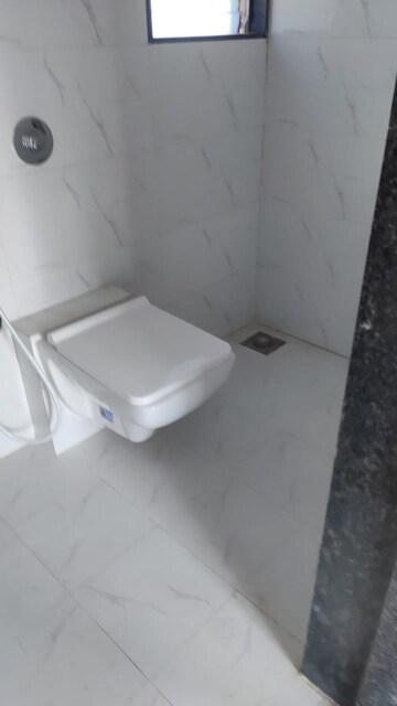 Bathroom in 2 BHK Apartment at Akshay CHS Andheri, Andheri West – for Sale