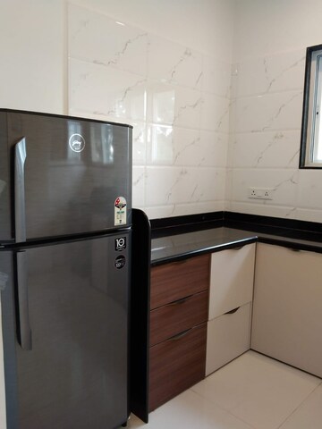 Kitchen in 3 BHK Apartment at Swiss County, Thergaon – for Sale
