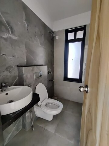 Bathroom in 1 BHK Apartment at MICL Aaradhya Highpark, Mira Road – for Rent