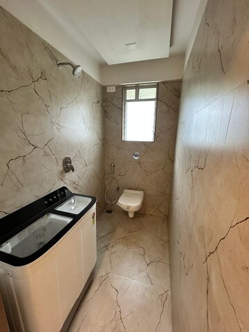 Bathroom in 2 BHK Apartment at Squarefeet Ace Square, Ghodbunder Road – for Sale