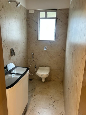 Bathroom in 2 BHK Apartment at Squarefeet Ace Square, Ghodbunder Road – for Sale