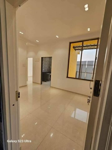 Living Room in 1 BHK Apartment at Venkatesha Apex Paradise, Vadghar – for Sale