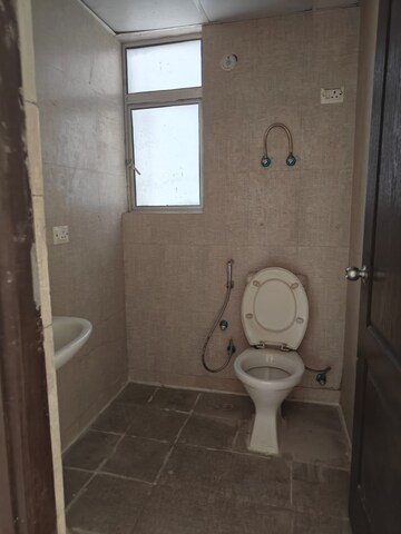 Bathroom in 1 BHK Apartment at Aditya Urban Homes, Shahpur Bamheta – for Sale