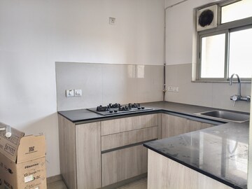 Kitchen in 1 BHK Apartment at Hiranandani Estate Solitaire C, Ghodbunder Road – for Rent