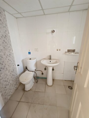 Bathroom in 3 BHK Apartment at Rajhans Apartments, Indrapuram – for Sale