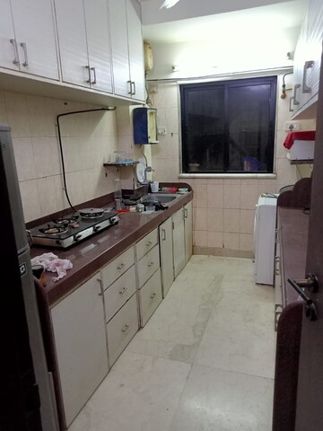 Kitchen in 3 BHK Apartment at Shiv Parvati Apartments Andheri, Andheri West – for Sale