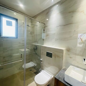 Bathroom in 3.5 BHK Builder Floor at Ansal API Esencia, Sector 67 – for Sale