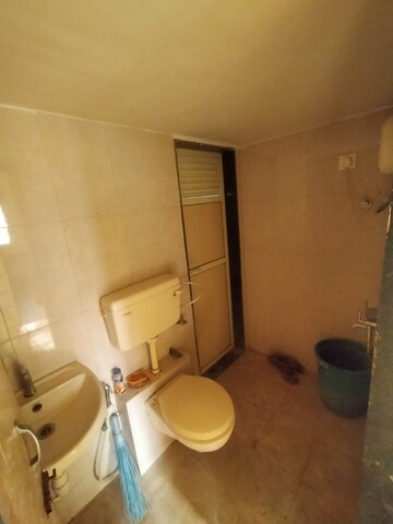 Bathroom in 1.5 BHK Apartment at Laxmi Avenue D Global City Ph-II, Virar West – for Rent