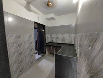 Bathroom in 2 BHK Apartment at Surya Kiran CHS Andheri, Andheri West – for Rent