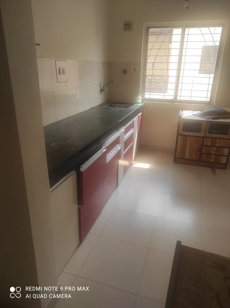Kitchen, united-marvel 2 Bedroom 820 Sq.Ft. Apartment In Viman Nagar Pune 8165603