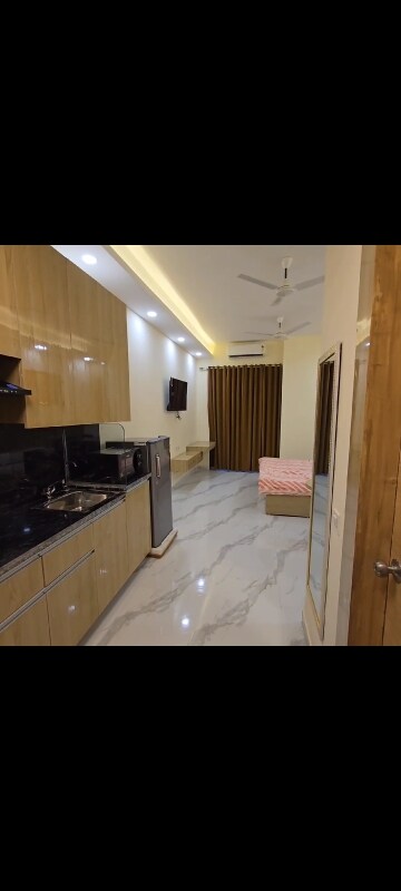 Kitchen in Studio Apartment at Gaur City Center, Sector 4 Greater Noida – for Rent