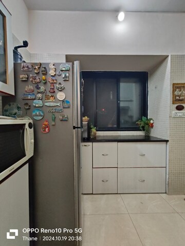 Kitchen in 3 BHK Apartment at T Bhimjyani Neelkanth Woods, Manpada – for Sale