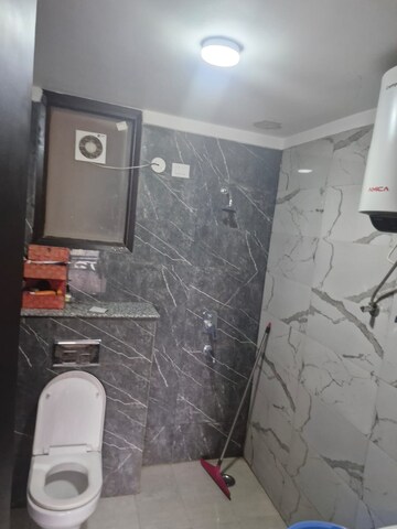 Bathroom in 3 BHK Builder Floor at Ansal API Esencia, Sector 67 – for Sale