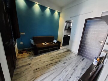 Living Room in 2 BHK Apartment at Gardenia Golf City, Sector 75 – for Rent