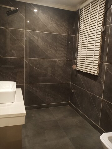 Bathroom in 4 BHK Builder Floor at Parklands, Sector 85 – for Sale