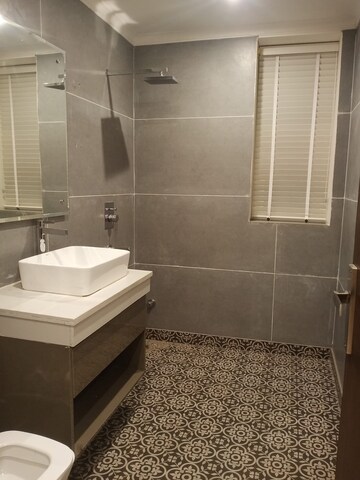 Bathroom in 4 BHK Builder Floor at Parklands, Sector 85 – for Sale