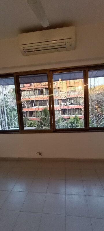 Room in 2 BHK Apartment at Bandra West – for Rent