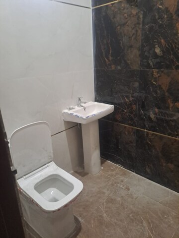 Bathroom in 2.5 BHK Builder Floor at Dhakoli Village – for Sale