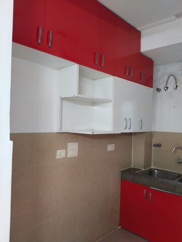 Kitchen in 3 BHK Apartment at Purvanchal Royal Park, Sector 137 – for Sale