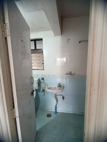 Bathroom in 2 BHK Apartment at Swojas Aarohi, Erandwane – for Sale