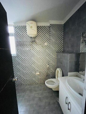 Bathroom in 4 BHK Apartment at East Canal Road – for Rent