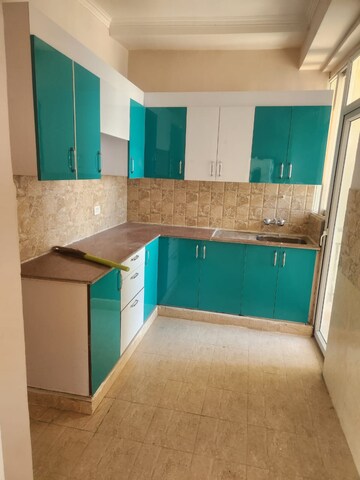 Kitchen in 2 BHK Apartment at Amrapali Golf Homes, Sector 4, Greater Noida – for Rent
