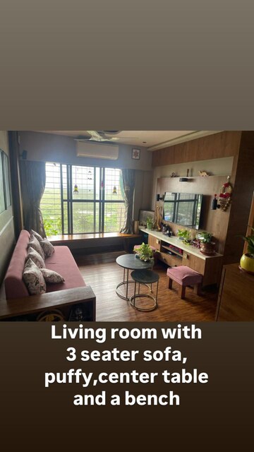 Living Room in 2 BHK Apartment at Rustomjee Meridian, Kandivali West – for Sale