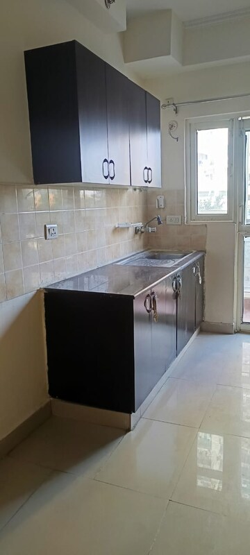 Kitchen in 2 BHK Apartment at Gardenia Golf City, Sector 75 – for Rent