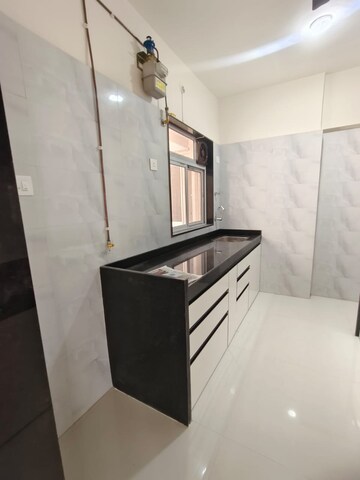 Kitchen in 3 BHK Apartment at Wadhwa TW Gardens, Kandivali East – for Rent