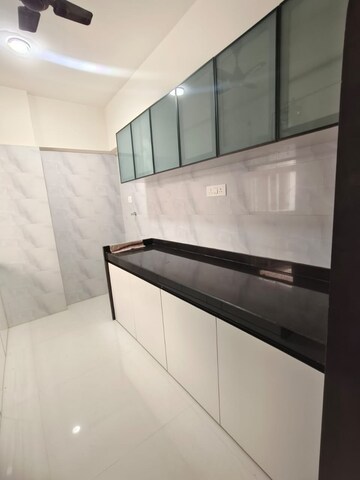 Kitchen in 3 BHK Apartment at Wadhwa TW Gardens, Kandivali East – for Rent
