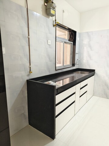 Kitchen in 3 BHK Apartment at Wadhwa TW Gardens, Kandivali East – for Rent