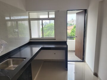 Kitchen in 1 BHK Apartment at Vedant Kingston Greens Phase 1, Pisoli – for Sale