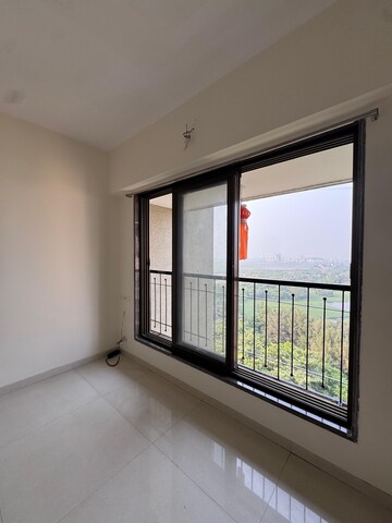 Room in 2 BHK Apartment at Abrol Avirahi Heights, Malad West – for Sale