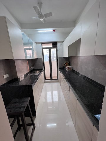 Kitchen in 1 BHK Apartment at Aashirwad Apartments, Andheri West – for Rent
