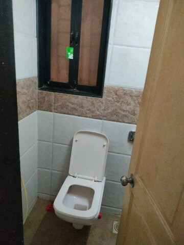 Bathroom in 1 BHK Apartment at Sinchan CHS, Andheri West – for Rent