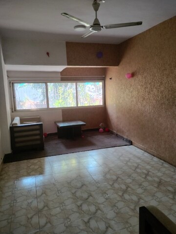 Living Room in 1 BHK Apartment at Sinchan CHS, Andheri West – for Rent
