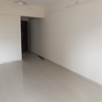 Living Room in 1 BHK Apartment at Drushti Group Embassy, Naidu Colony – for Rent